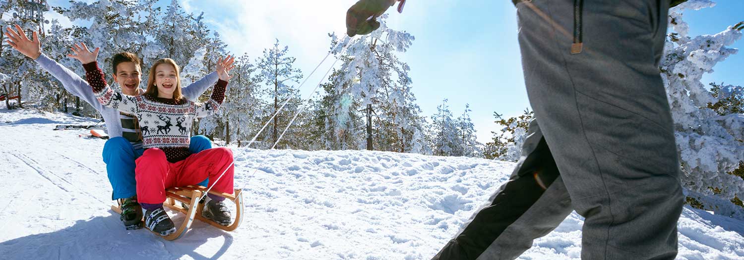 Schlittenfahren - ein Spass für die gesamte Familie
